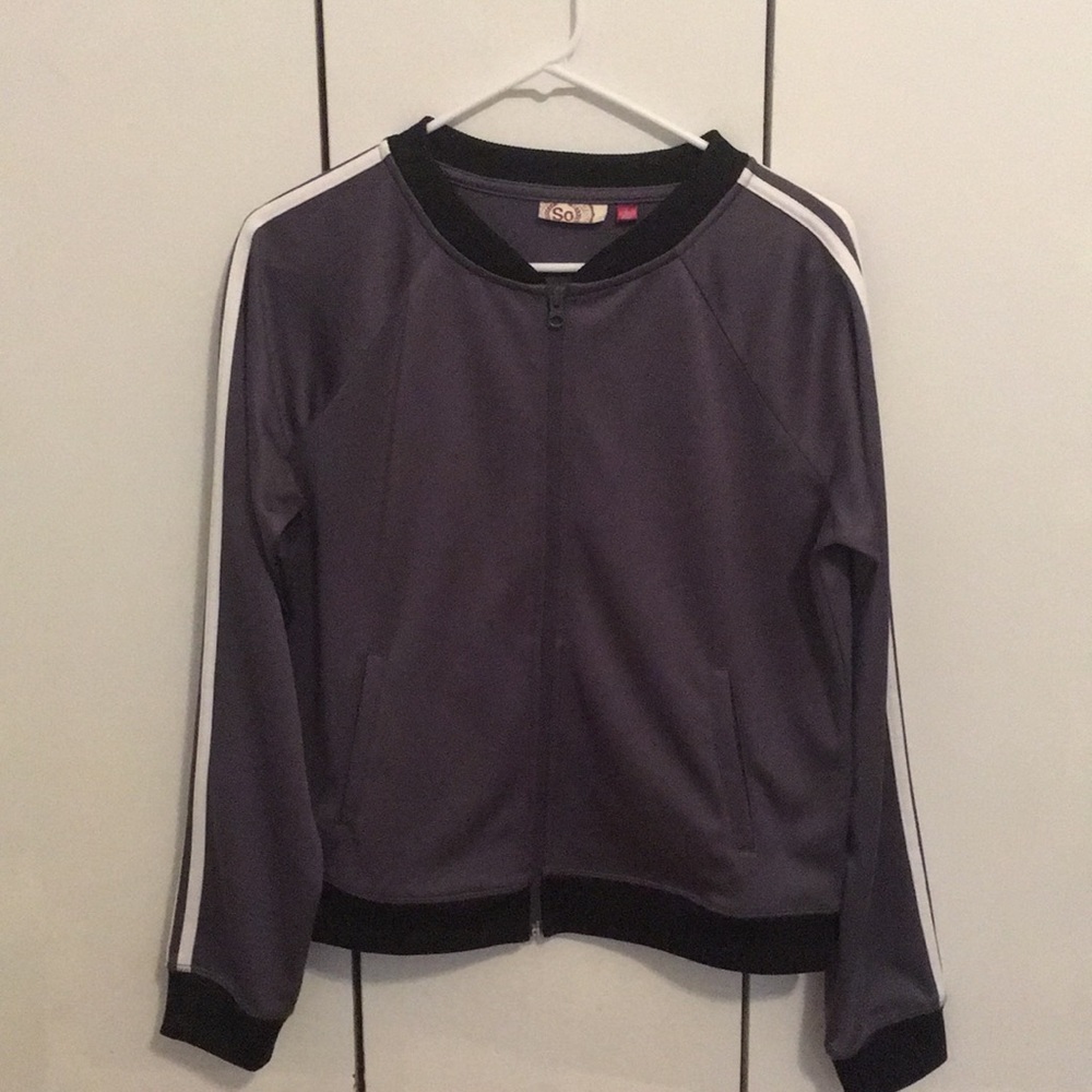 dark gray zip-up sports jacket.